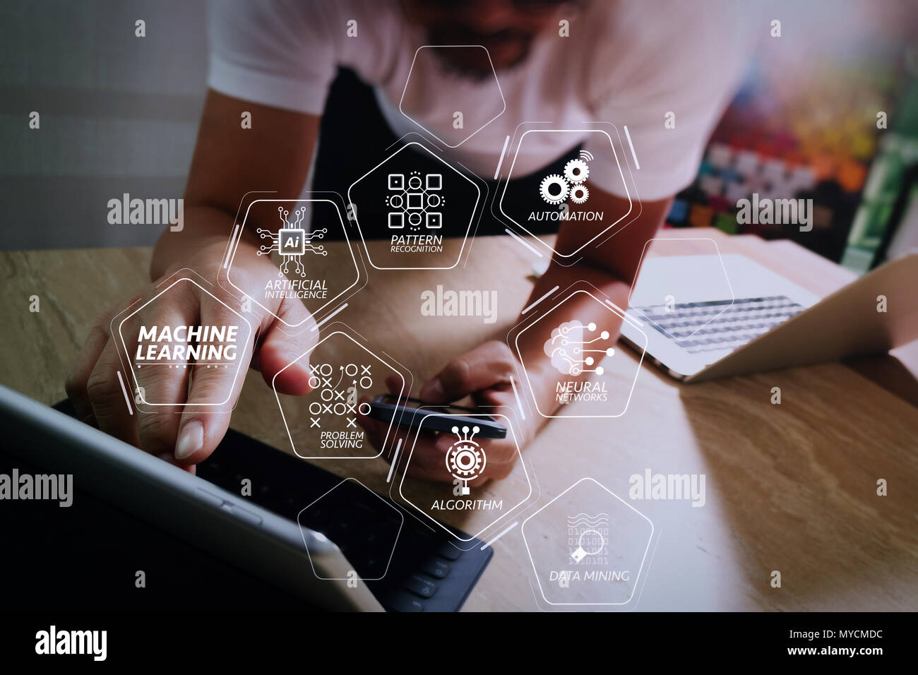Machine learning technology diagram with artificial intelligence (AI),neural network,automation,data mining in VR screen.designer using smart phone an Stock Photo