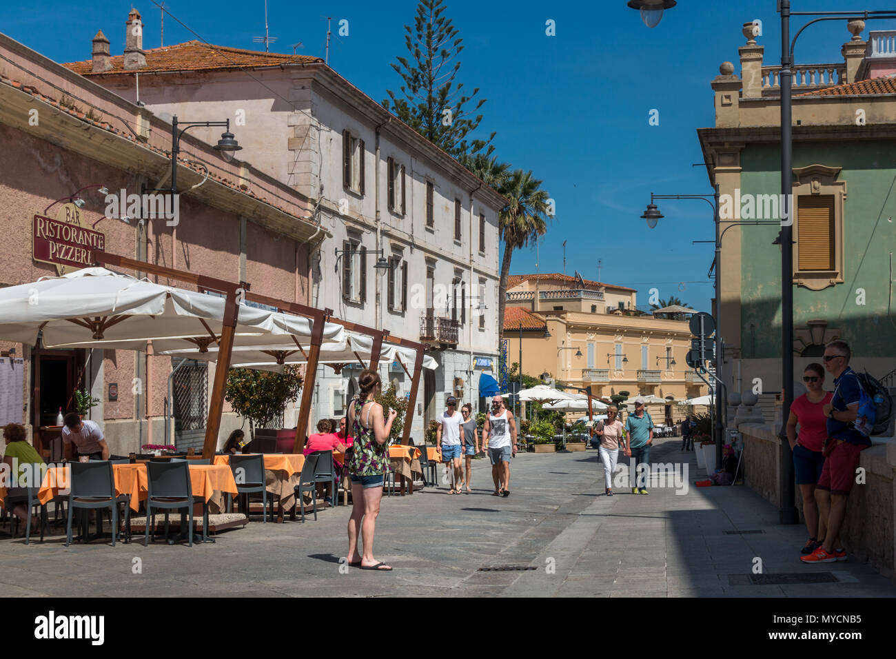 Main tourist street of Olbia old town with cafes and restaurants ...