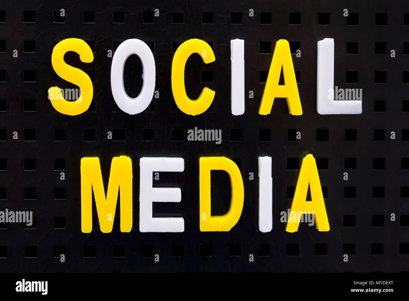 SOCIAL MEDIA spelt out on a peg board Stock Photo Alamy