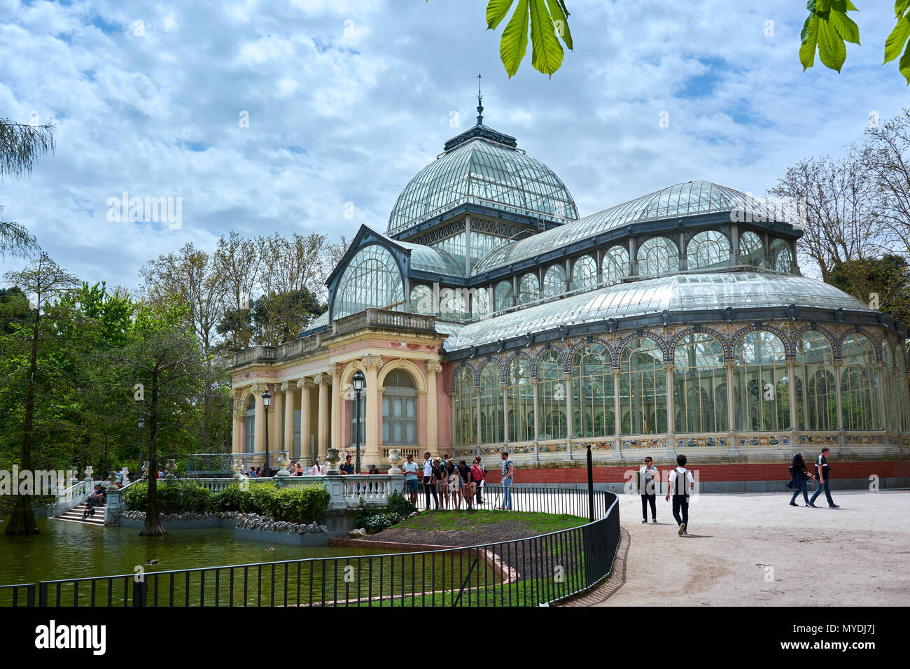 MADRID, SPAIN - APRIL 23, 2018: Beautiful view of the majestic Glass Palace in the Park of Good Retirement (Parque del Buen Retiro) of Madrid, Spain. Stock Photo