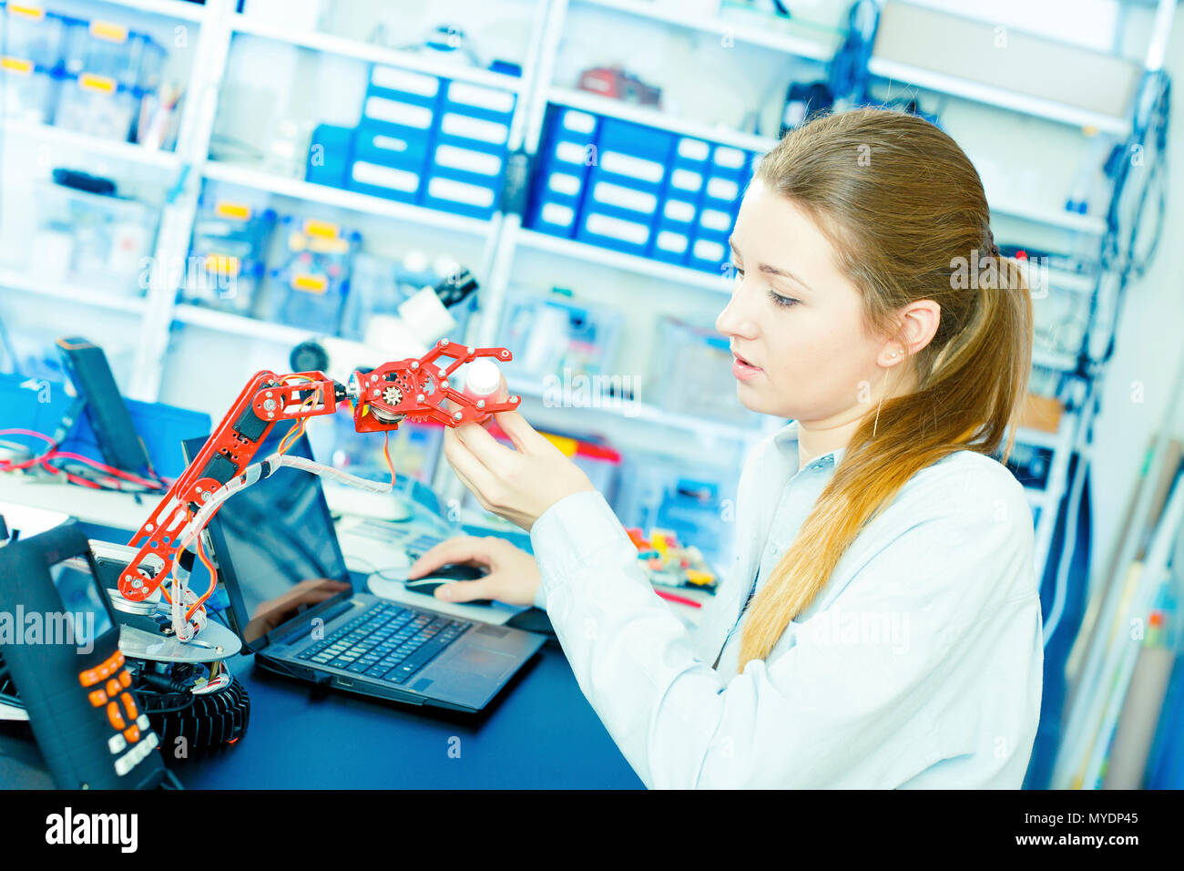Engineer working with robotic arm Stock Photo Alamy