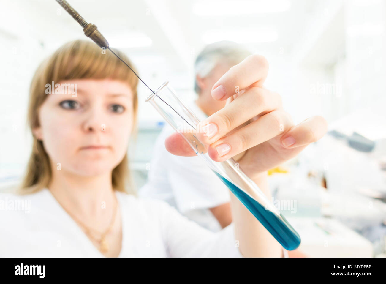 Biological research. Technician with solution Stock Photo Alamy
