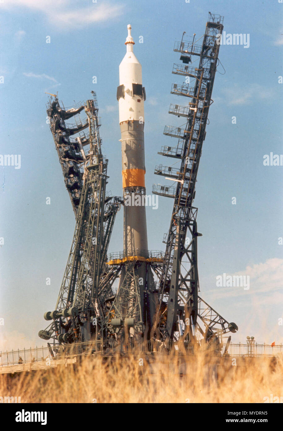 The Soyuz spacecraft and launch vehicle are installed on the launch pad at the Baikonur complex in Kazakhstan. Baikonur is the world's largest space center. This launch was part of the Apollo-Soyuz Test Project (ASTP), a cooperative space mission between the United States and the USSR. Stock Photo