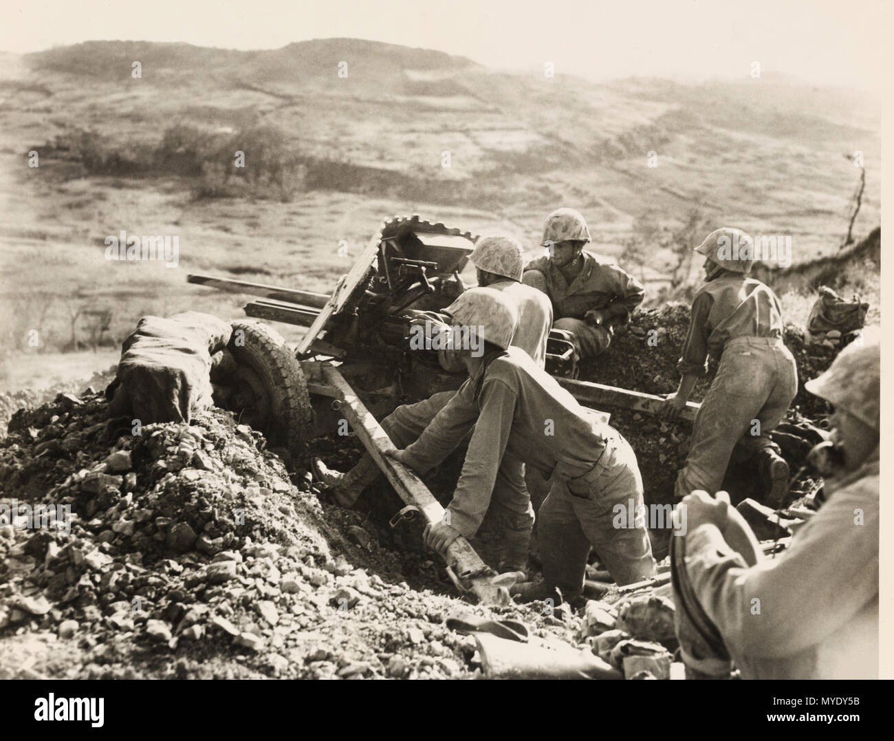 Emplaced A marine gun crew has emplaced a 37mm gun to trade blows with Japanese ...