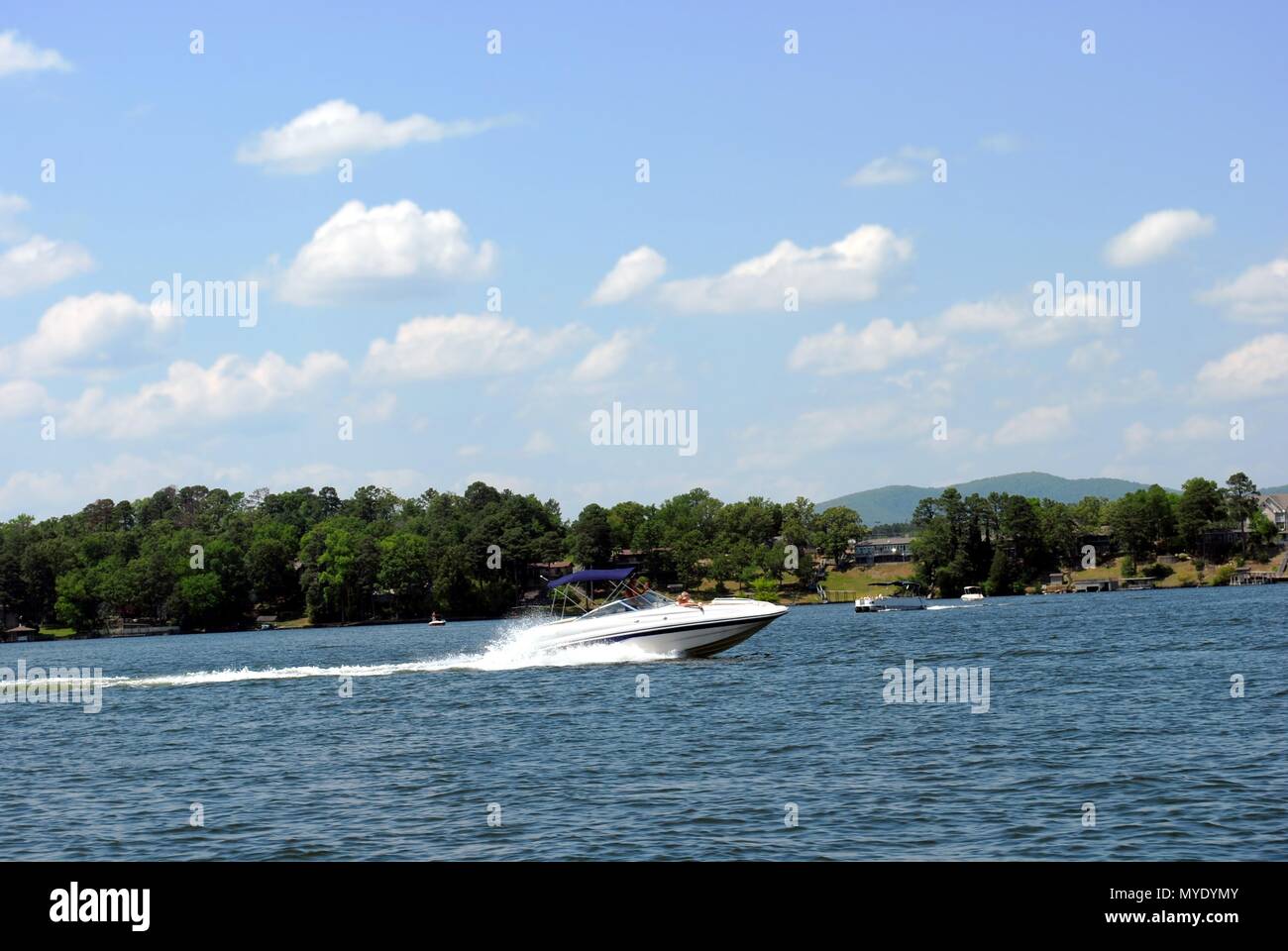 Lake Hamilton a lake in Hot Springs Arkansas with boat with wake and