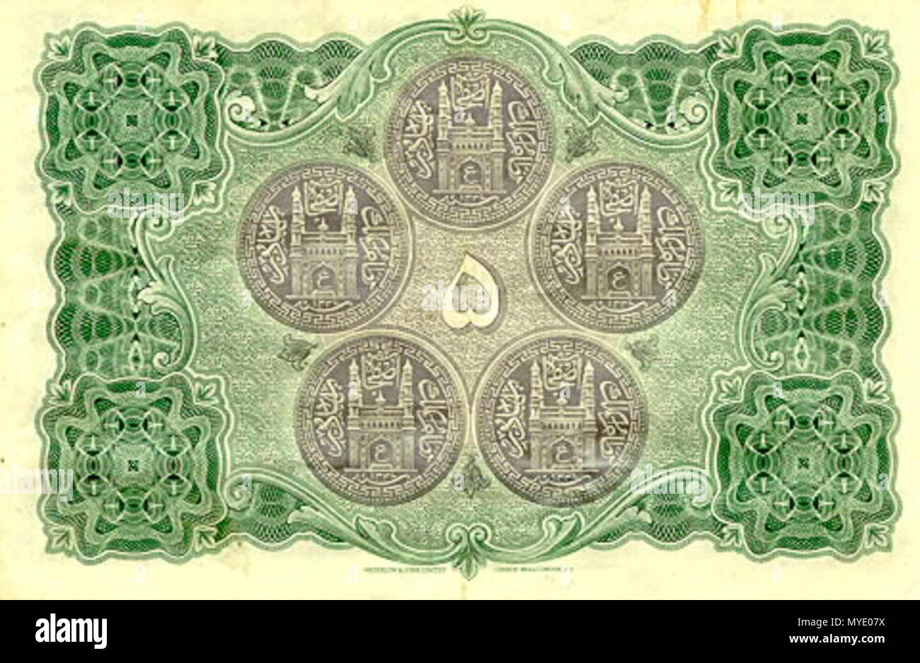 . English: Five-rupee note from Hyderabad, labeled multilingually and dated Feb. 1, 1347 A.H. (1928/9) Source: http://www.fortunecity.com//victorian/coldwater/9/hyd1.html (downloaded Nov. 1999) 'Hyderabad was the only state which had a full fledged paper currency which came into existence in 1916, and enjoyed wide circulation till 1952. The notes were printed till 1939 by Waterlow & Sons, and then onwards by the Security Press at Nasik. The notes are dated in 'Fasli' years, an era which was current in the Deccan, associated closely with the Hijri era. The notes are printed entirely in Urdu and Stock Photo