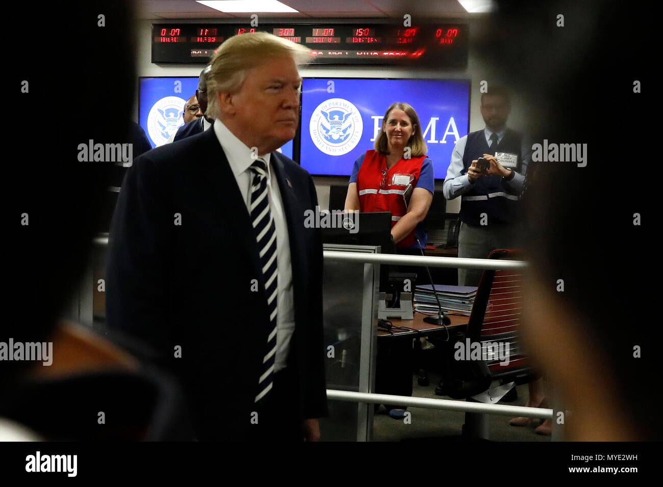 Washington, DC. 6th June, 2018. United States President Donald J. Trump greets employees at the National Response Coordination Center at the Federal Emergency Management Agency Headquarters on June 6, 2018 in Washington, DC. Credit: Yuri Gripas/Pool via CNP | usage worldwide Credit: dpa/Alamy Live News Stock Photo