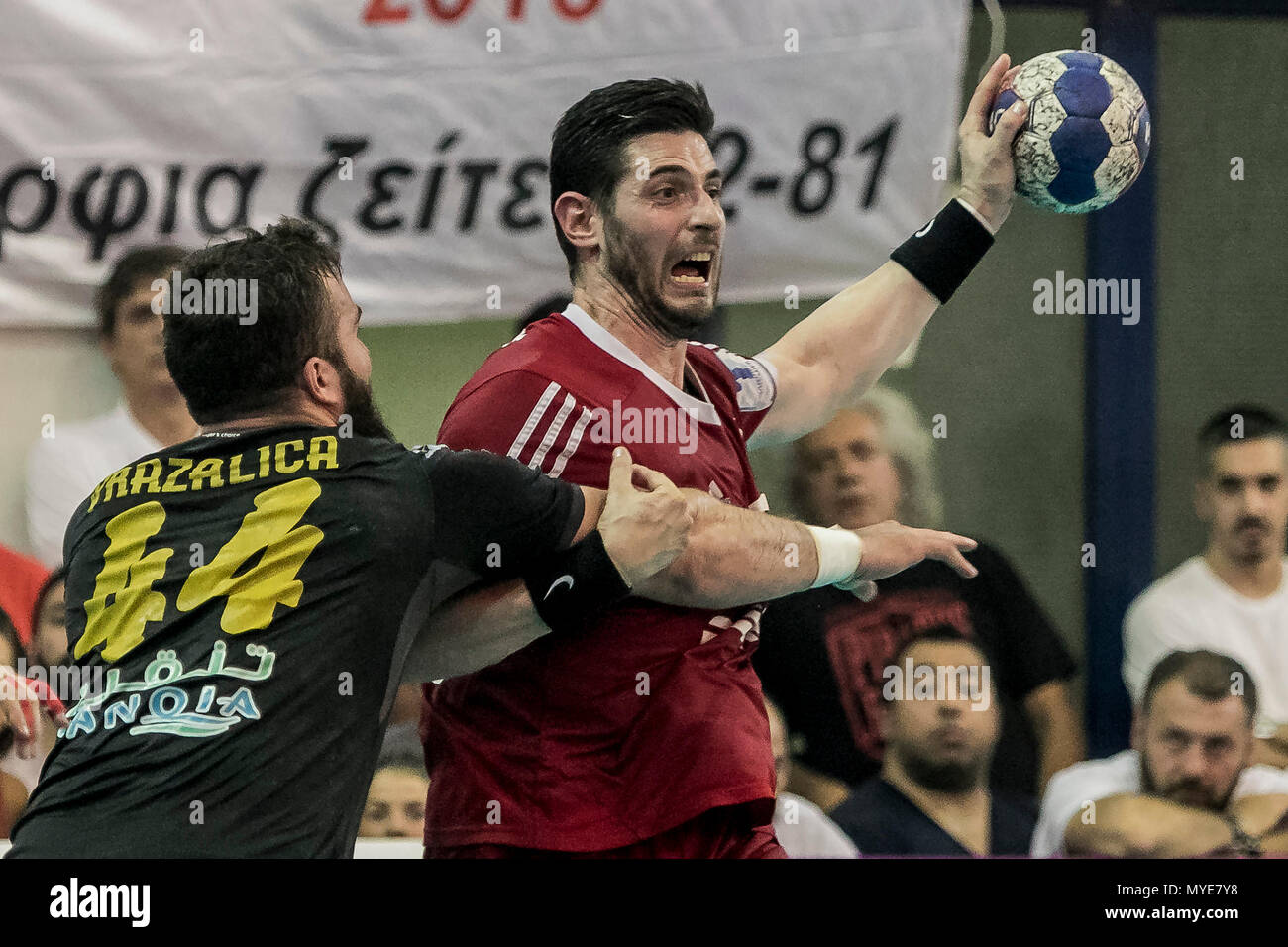Athens, Greece. 6th June, 2018. Olympiacos' Alexandros Alvanos (R) breaks  through during the Greek Men's Handball Championship Final between AEK and  Olympiacos in Athens, Greece, June 6, 2018. Credit: Panagiotis  Moschandreou/Xinhua/Alamy Live