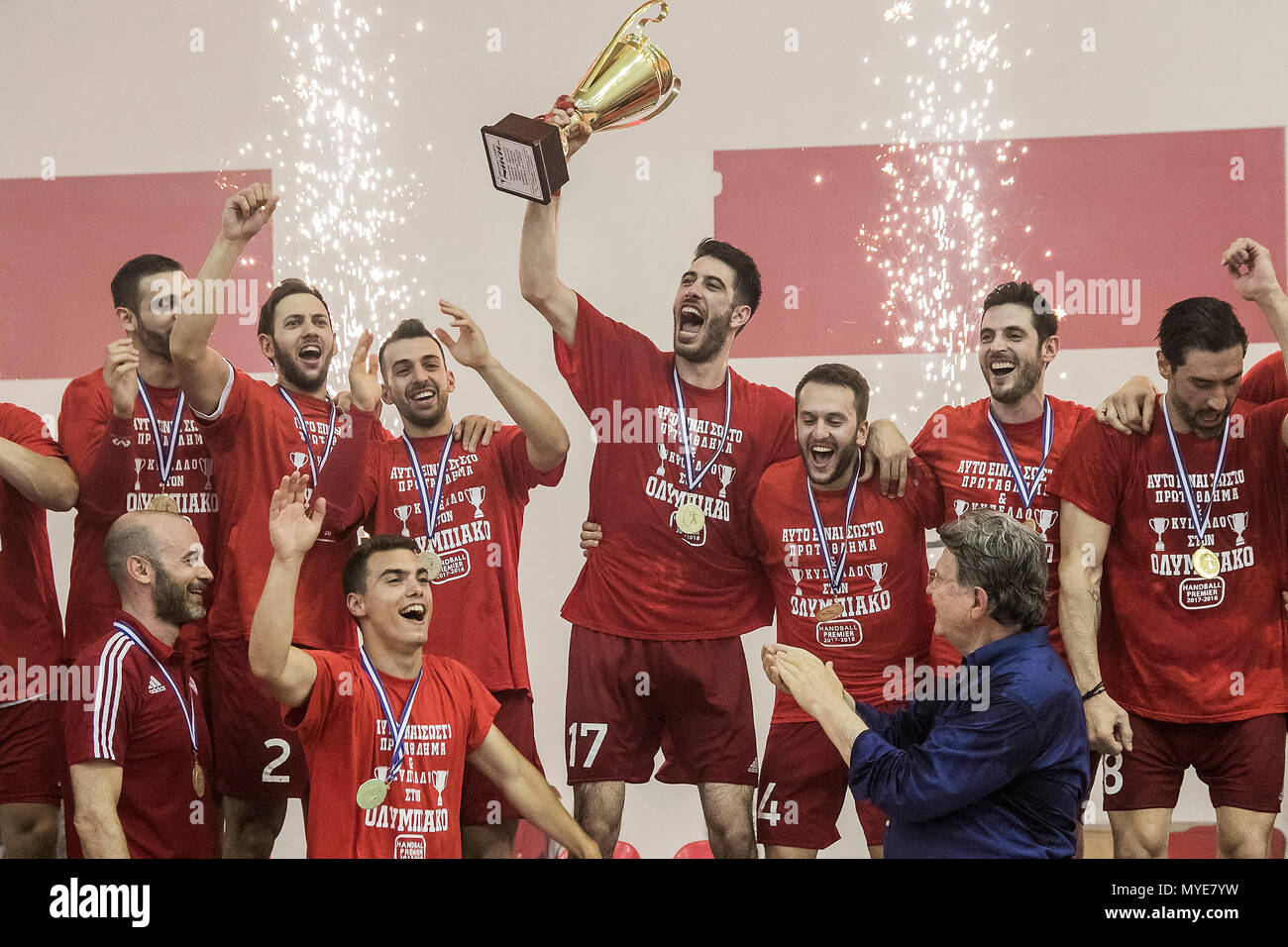 Athens, Greece. 6th June, 2018. Olympiacos' players celebrate with the  trophy during the awarding ceremony for the Greek Men's Handball  Championship Final between AEK and Olympiacos in Athens, Greece, June 6,  2018.