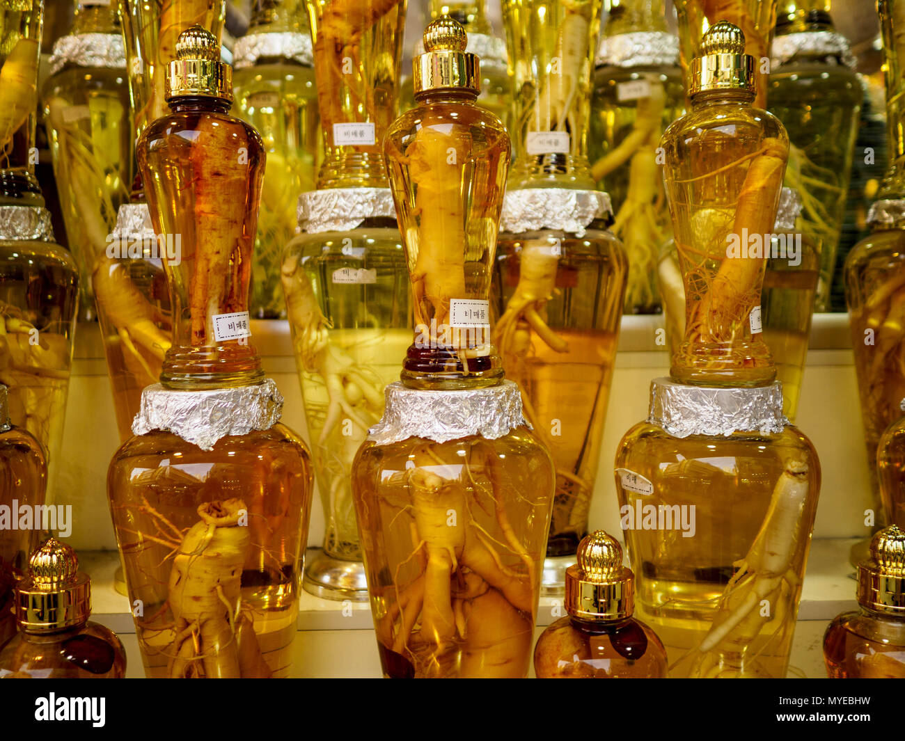 June 7, 2018 - Seoul, Gyeonggi, South Korea - Traditional Korean drink with ginseng in it in Namdaemun Market. Namdaemun Market is one of the oldest continually running markets in South Korea, and one of the largest retail markets in Seoul.[6] The streets in which the market is located were built in a time when cars were not prevalent, so the market itself is not accessible by car. The main methods of transporting goods into and out of the market are by motorcycle and hand-drawn carts. It occupies many city blocks, which are blocked off from most car traffic due to the prevalence of parking co Stock Photo