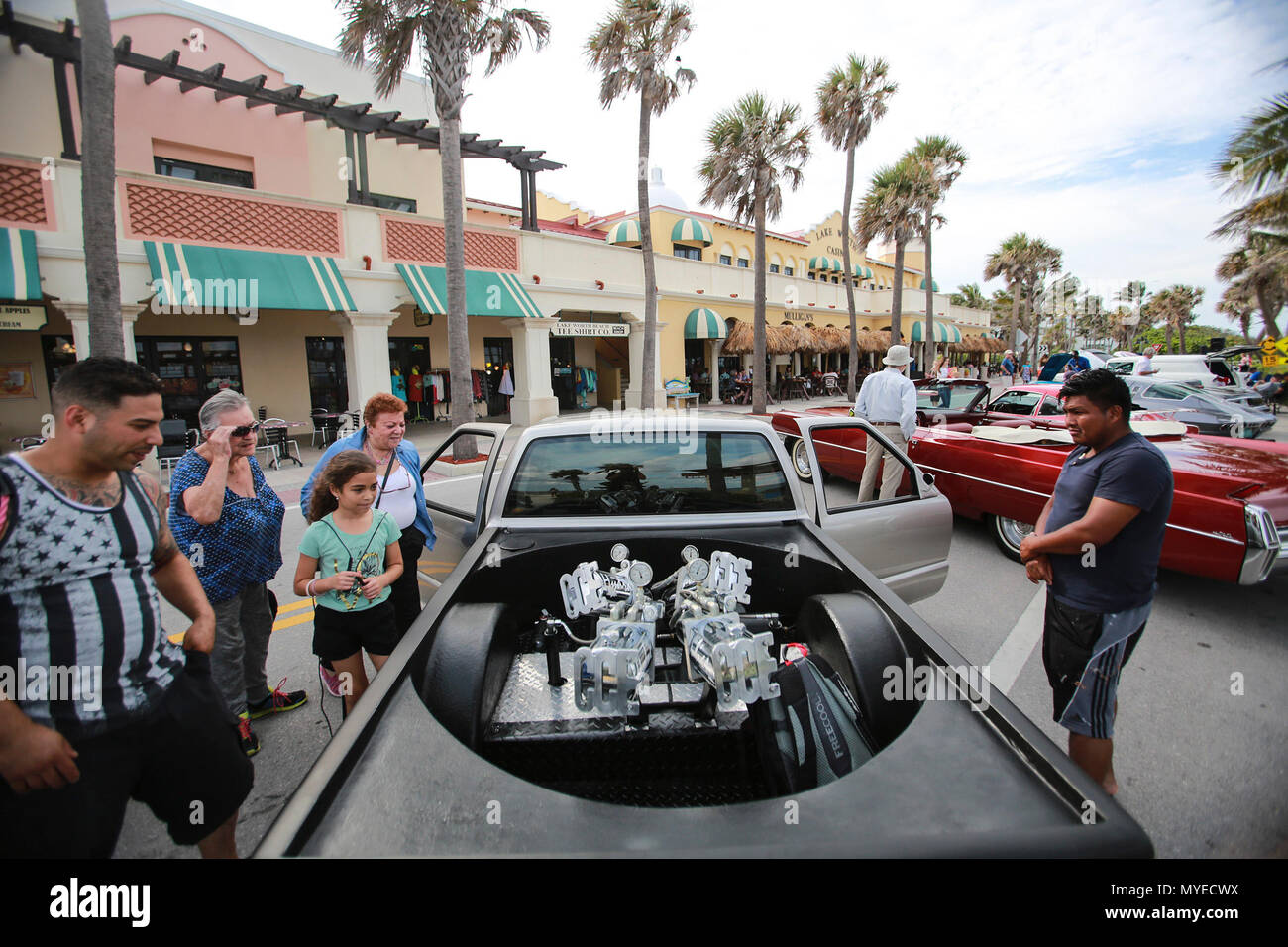 Florida, USA. 7th June, 2018. Visitors to the MG Productions Car Show at the Lake Worth Casino Building & Beach Complex check out a customized 1997 Isuzu pickup truck belonging to Ben Pellow of Palm Beach Gardens Thursday, May 10, 2018. ''I put hydraulics in for each wheel, '' he said. ''I can do seesaws, pancakes, dump the left side or the right side. I put titanium plates under it, so I can drag and throw white sparks. Credit: Bruce R. Bennett/The Palm Beach Post/ZUMA Wire/Alamy Live News Stock Photo