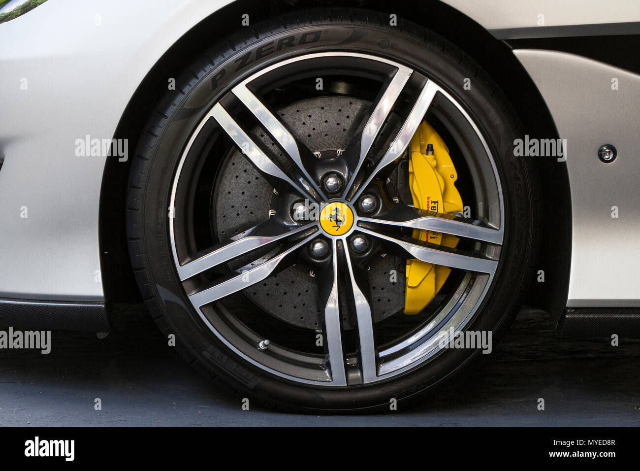 Torino, Italy. 7th June 2018. Ferrari logo on a wheel rim. 2018 edition of Parco Valentino car show hosts cars by many automobile manufacturers and car designers inside Valentino Park in Torino, Italy Credit: Marco Destefanis/Alamy Live News Stock Photo