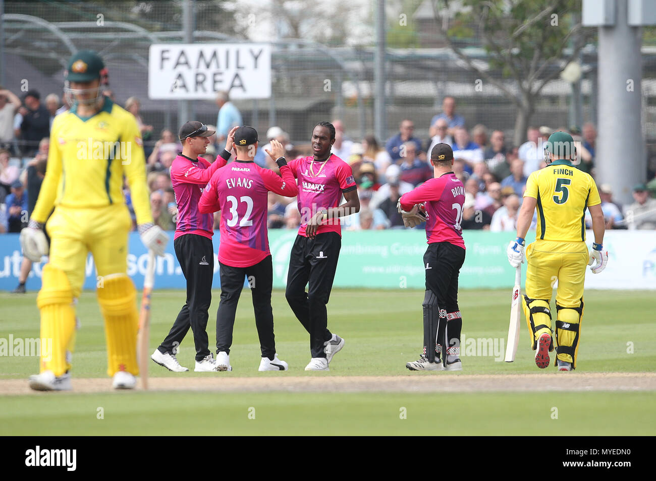 Hove, UK. 7th Jun, 2018. Jofra Archer ( C ) of Sussex celebrates taking the wicket of Aaron Finch of Australia ( R ) during the Tour match between Sussex v Australia at the 1st Central County Ground, Hove on 7th June, 2018 in Sussex, England. Editorial Use Only Credit: Paul Terry Photo/Alamy Live News Stock Photo