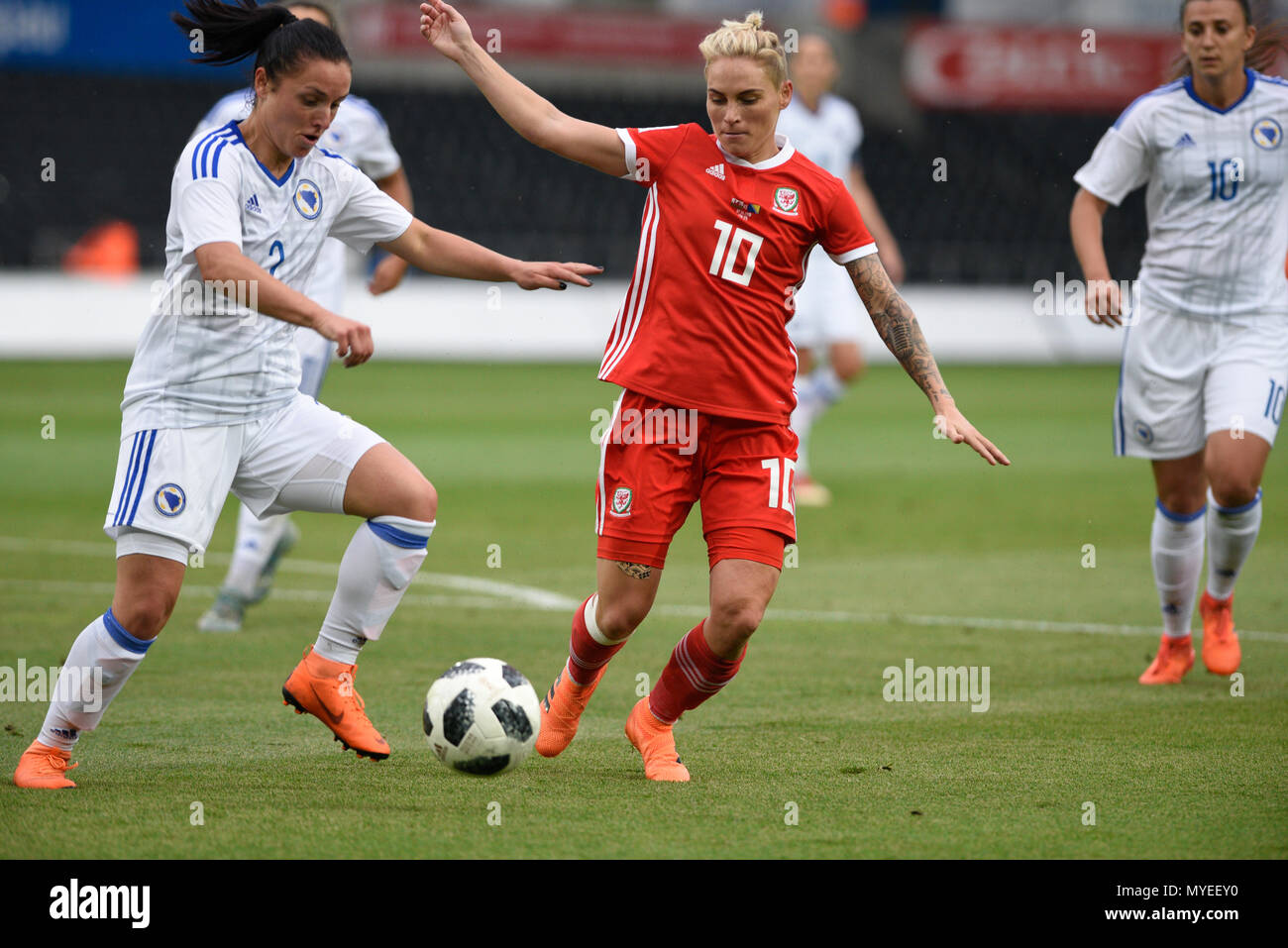 Swansea, UK. 7th Jun, 2018. Wales v Bosnia Womens International World Cup Qualifier, Liberty Stadium, Swansea,7/6/18: Jess fishlock of Wales competes for the ball Credit: Andrew Dowling/Influential Photography/Alamy Live News Stock Photo