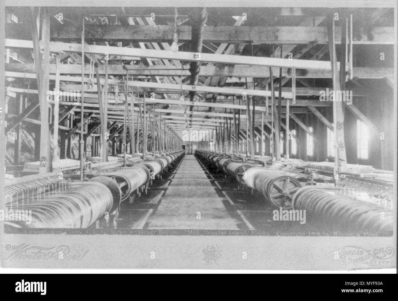 A.U.G.M. Co.'s 'ready bullion' mill, Douglas Island, Alaska- concentrator floor Stock Photo