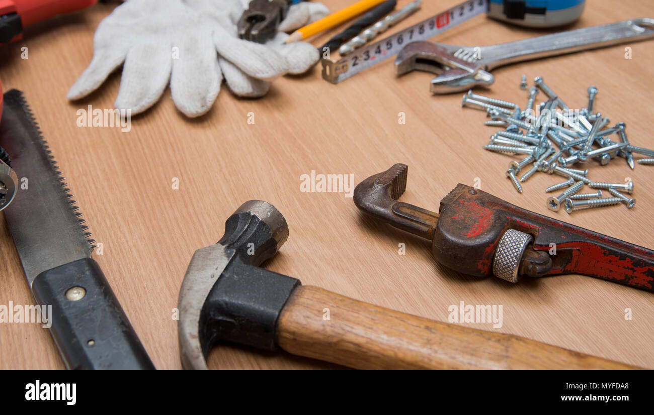 Construction Tools On Wooden Desk Stock Photo