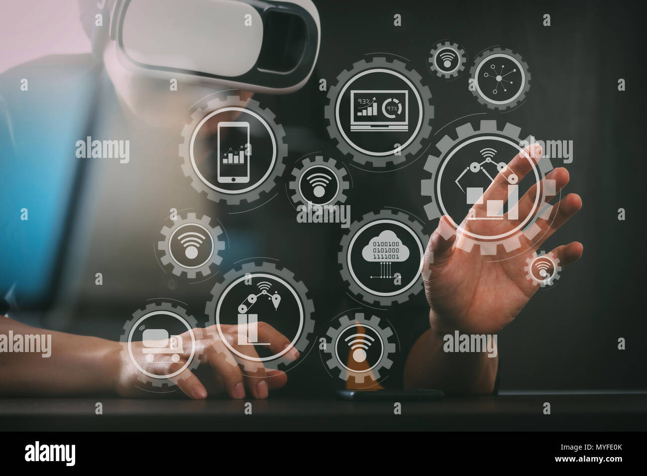 Smart factory and industry 4.0 and connected production robots exchanging data with internet of things (IoT) with cloud computing technology.businessm Stock Photo