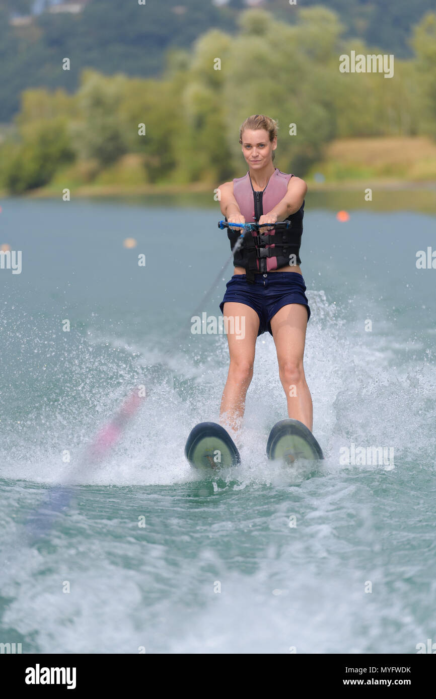Woman on water skis Stock Photo