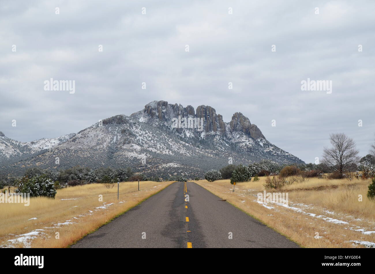 Highway in Big Bend area of West Texas after a March snow storm Stock