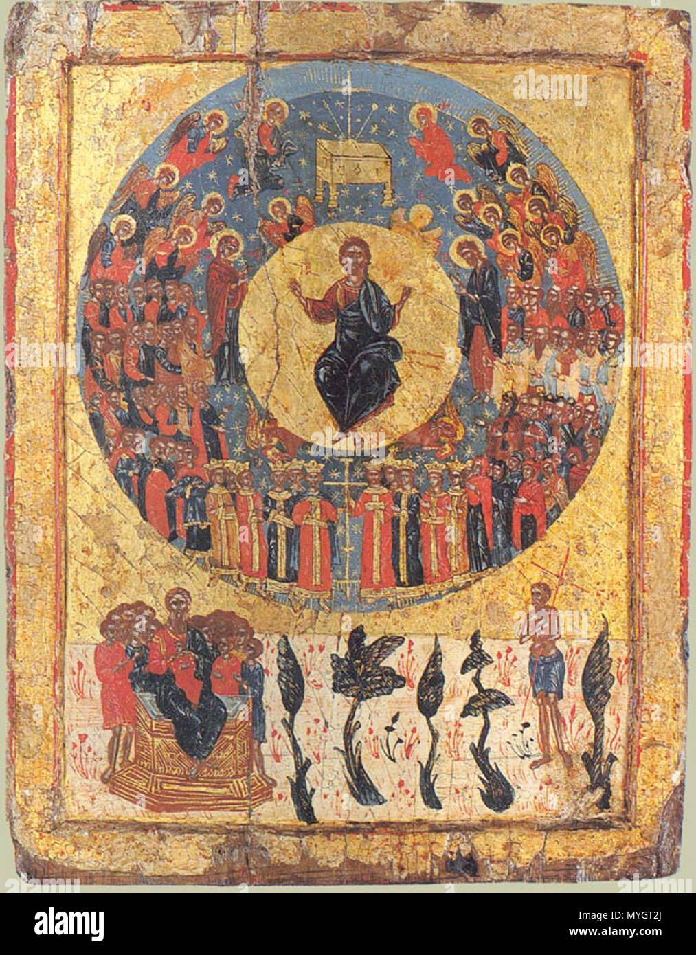 . Icon of Second Coming (also used for All Saints Sunday). Christ is enthroned in the center surrounded by the angels and saints, Paradise is at the bottom, with the Bosom of Abraham (left) and the Good Thief (right) holding his cross. Greece. Around 1700 Wood, gesso, tempera. Size - 34.5 x 27 cm Private Collection. Bibliography Sotheby's: Icons, Russian Pictures and Works of Art. London, 1991, p 155. Второе пришествие. Греция. Около 1700 г. Дерево, левкас, темпера. Размер - 34,5 х 27 см. Иконография Рай Лоно Авраамово Все святые Христос в Славе Второе пришествие Происхождение Неизвестно. Мест Stock Photo