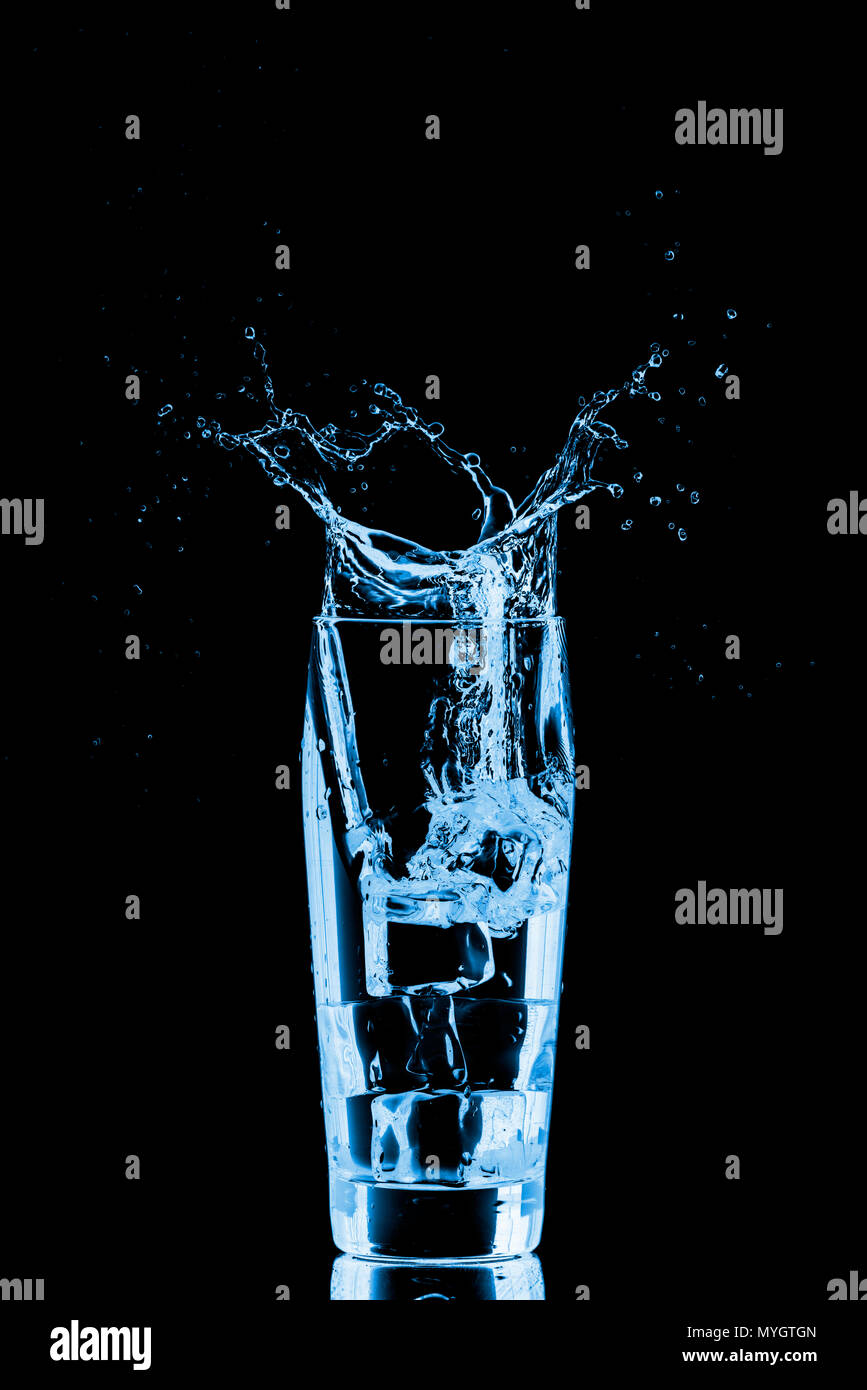 Glass of water with ice cubes Stock Photo - Alamy