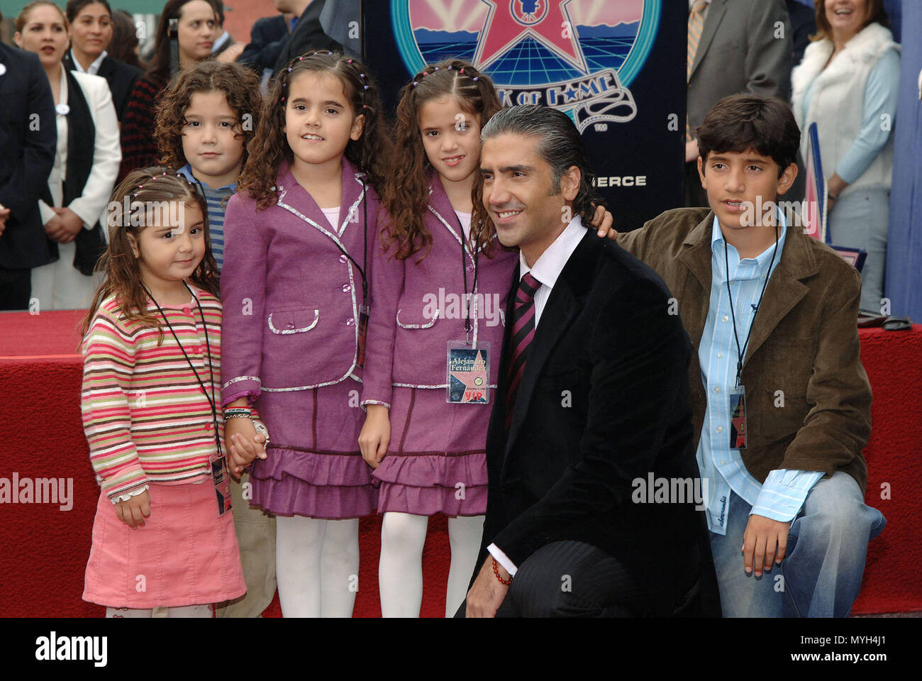 Alejandro Fernandez (posing with his daughters and son) was honored with a Star on the Hollywood Walk of Fame in Los Angeles. December 2, 2005.          -            FernandezAlejandro family star027.jpgFernandezAlejandro family star027  Event in Hollywood Life - California, Red Carpet Event, USA, Film Industry, Celebrities, Photography, Bestof, Arts Culture and Entertainment, Topix Celebrities fashion, Best of, Hollywood Life, Event in Hollywood Life - California, movie celebrities, TV celebrities, Music celebrities, Topix, Bestof, Arts Culture and Entertainment, Photography,    inquiry tsuni Stock Photo