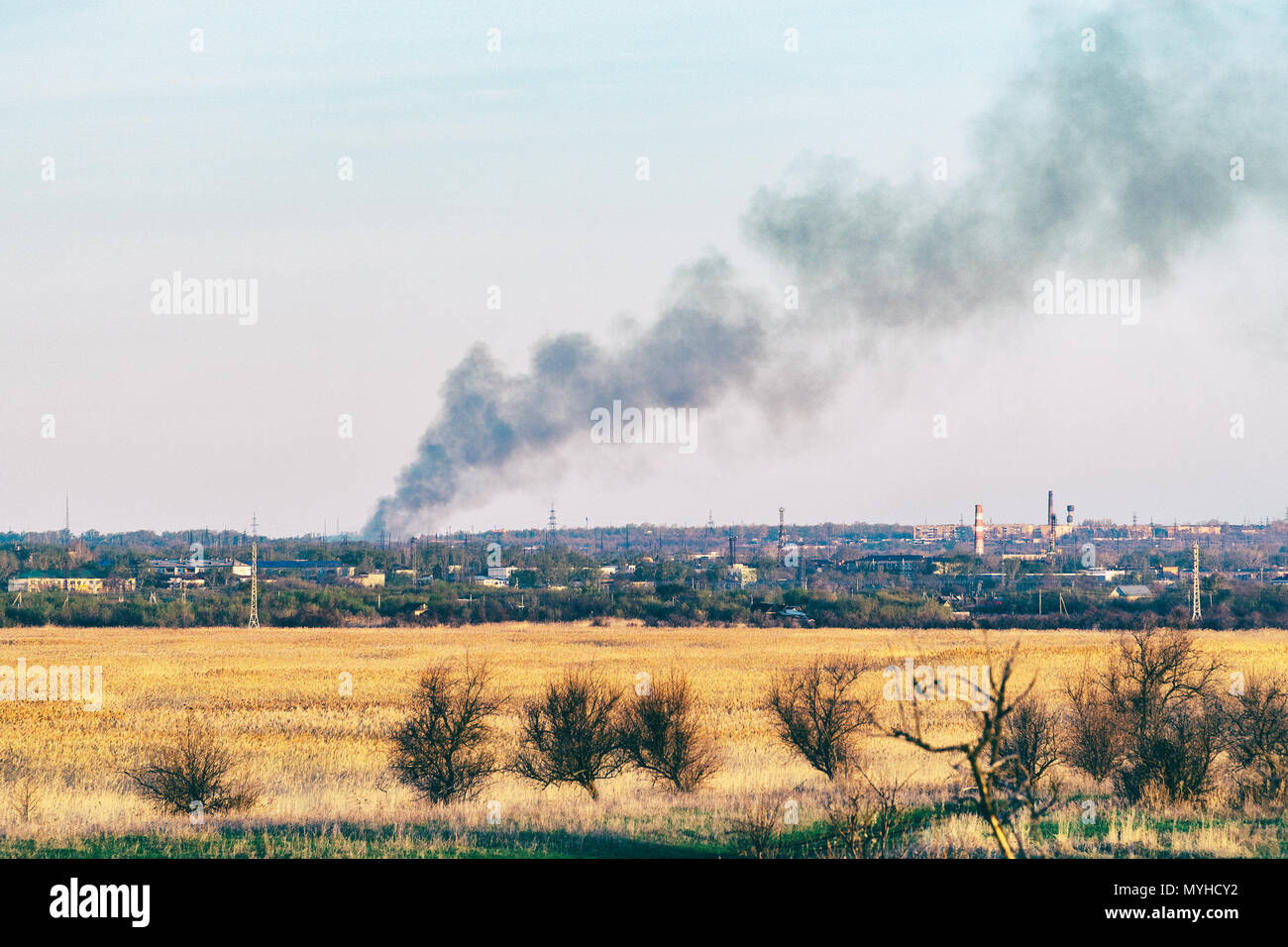 Smoke from a fire in the distance Stock Photo - Alamy