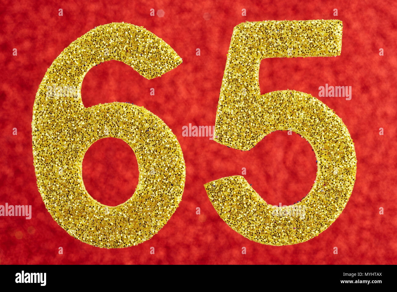 Number sixty-five yellow color over a red background. Anniversary. Horizontal Stock Photo
