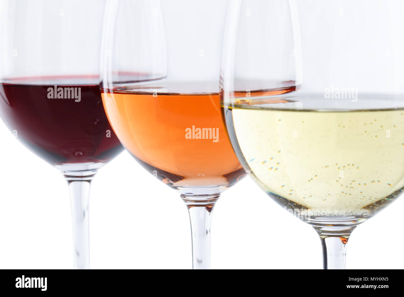 Wine glasses red rose selective focus isolated on a white background Stock Photo