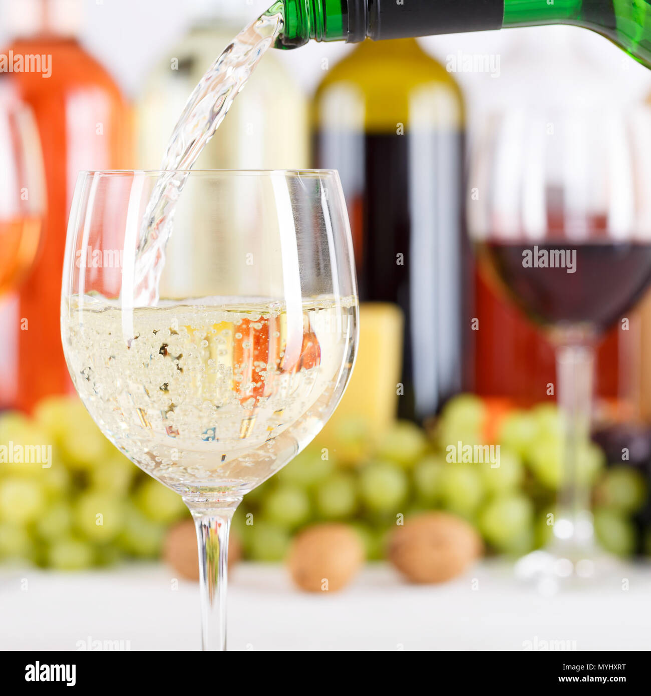 Wine pouring glass bottle white pour square squared Stock Photo