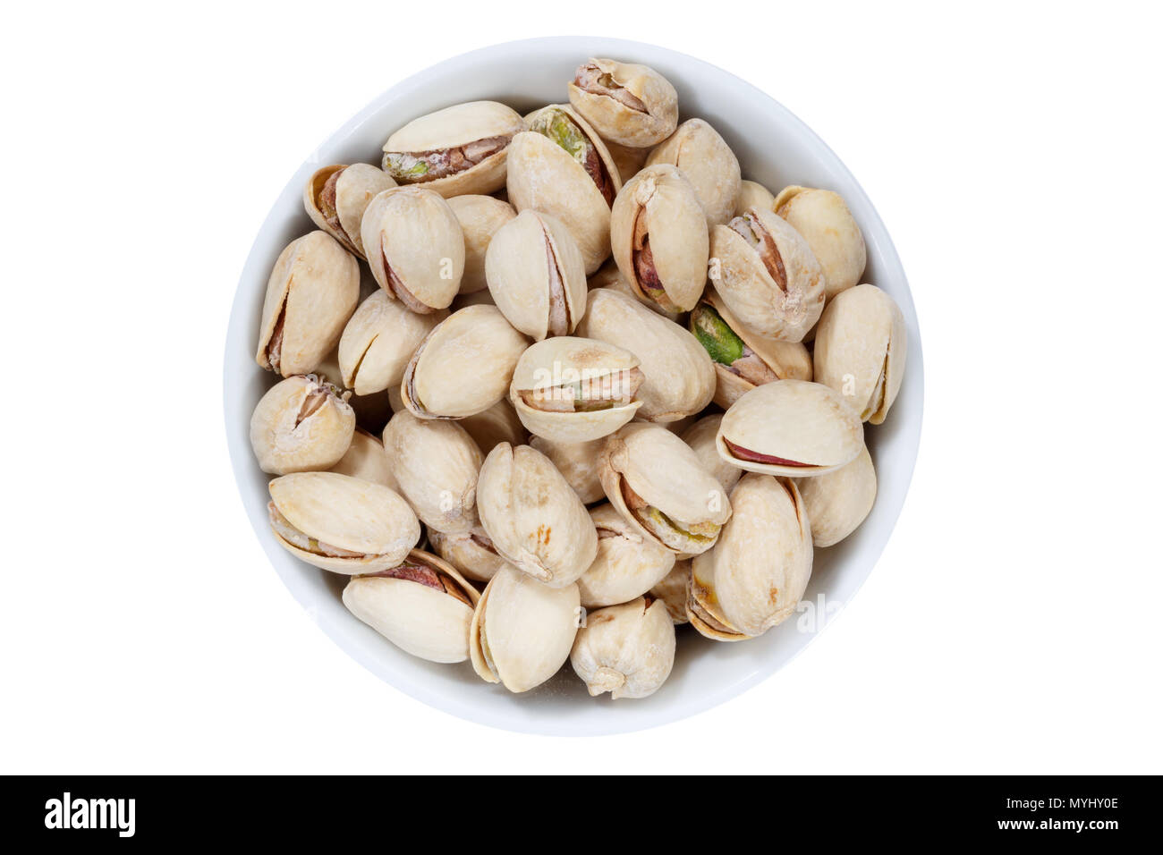 Pistachios pistachio nuts from above bowl isolated on a white background Stock Photo