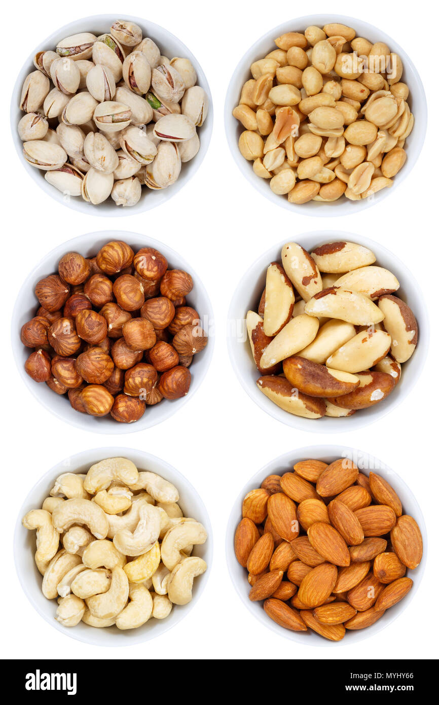 Nuts nut collection from above hazelnuts portrait format bowl isolated on a white background Stock Photo