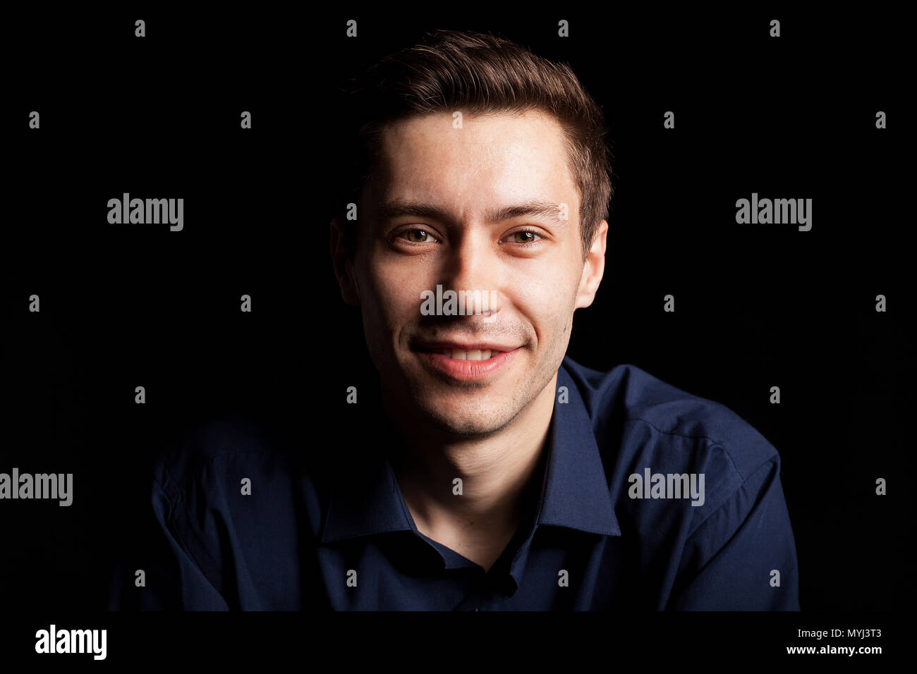 Portrait with fashion lighting of young man Stock Photo - Alamy