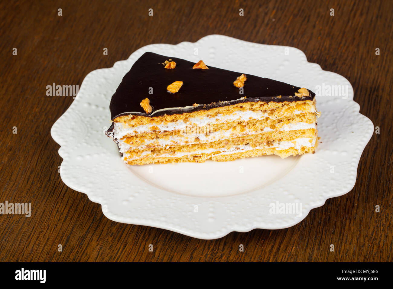 Sweet tasty cake with cream Stock Photo - Alamy