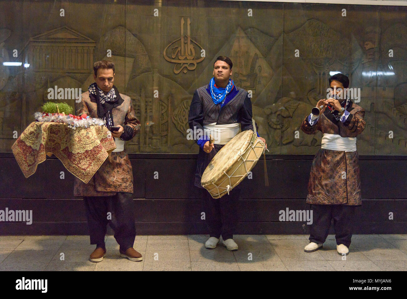 Tehran, Iran - March 19, 2018: Local street musicians play music in the metro station before Nowruz holiday Stock Photo