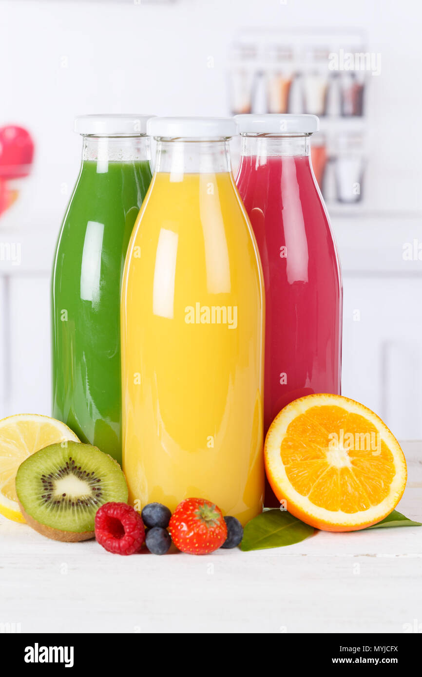 Green, Yellow, Orange and Red Smoothie in Glass Bottles Stock Photo - Image  of drink, diet: 161022426