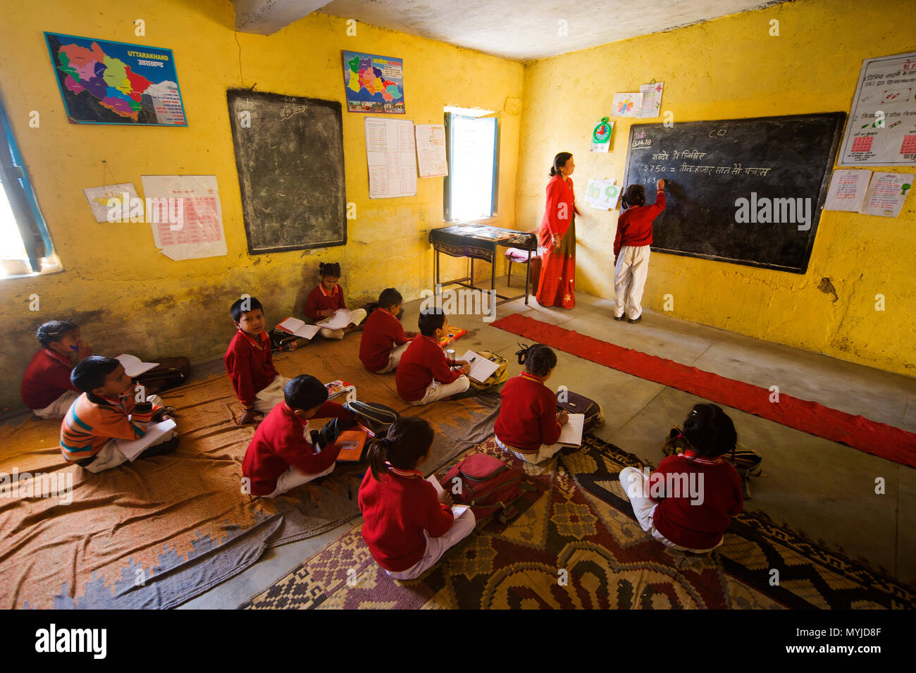 Indian kids in the classroom at the Primary school, Chakati village, Kumaon Hills, Uttarakhand, India Stock Photo