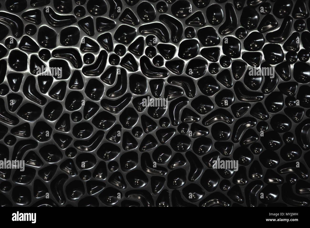 Black shinny textured background with copy space. Stock Photo