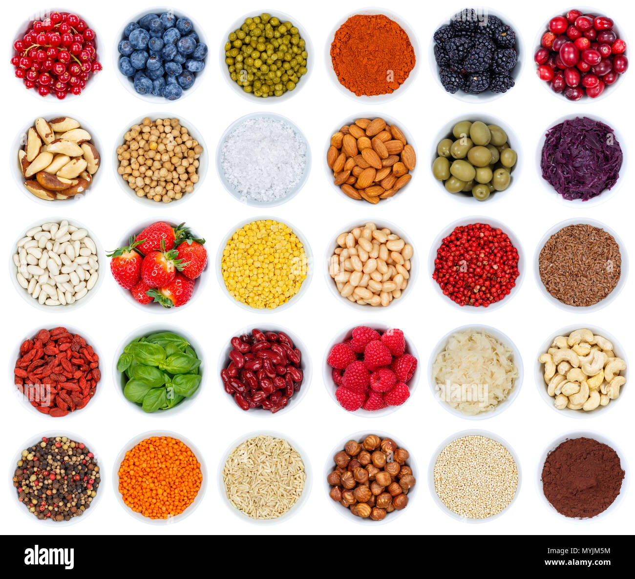 Collection of fruits and vegetables berries from above bowl isolated on a white background Stock Photo