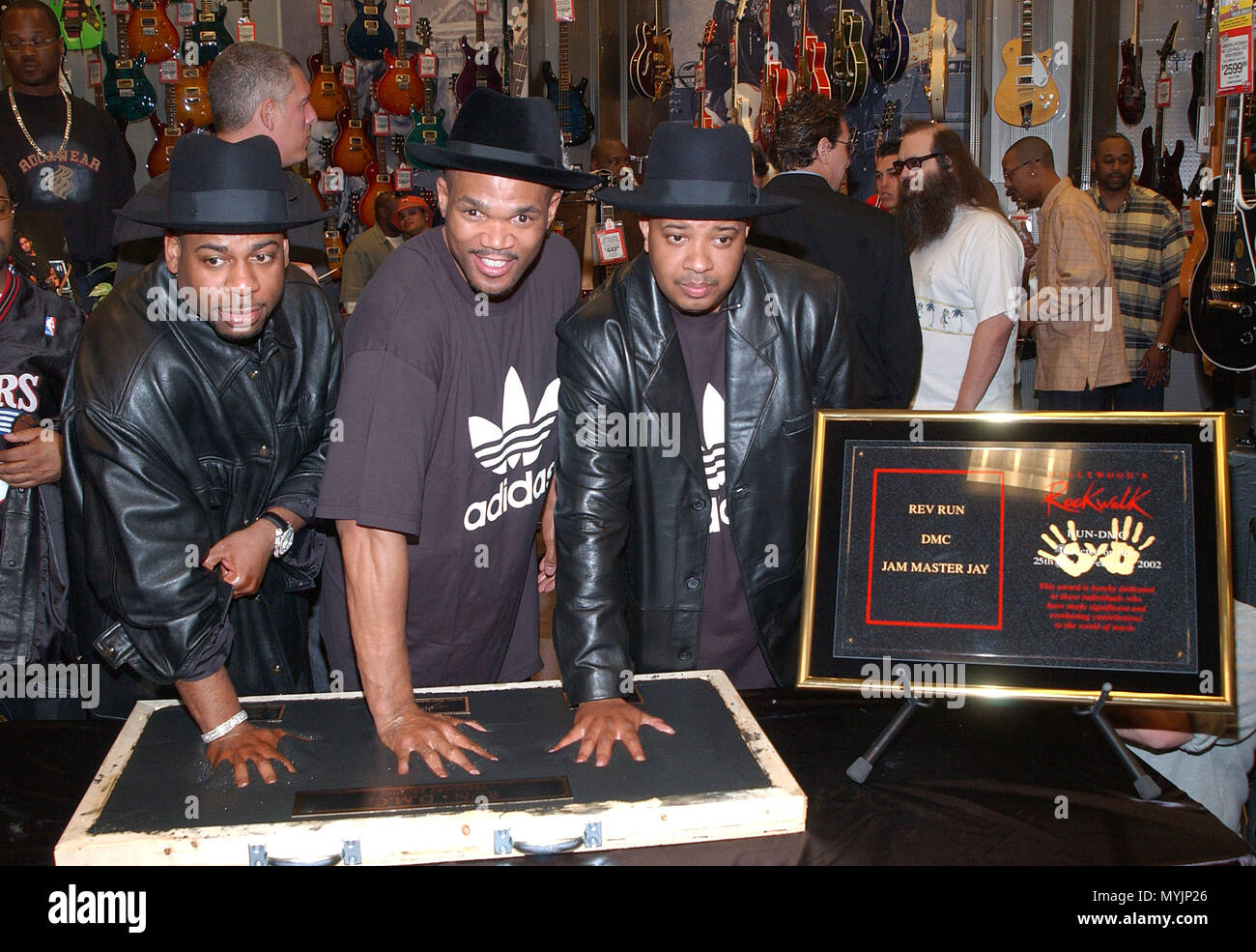 Run Dmc Was Inducted On The Hollywood Rock Walk Of Fame At The Guitar Center In Los Angeles February 25 02 Rundmc Rockwalk08 Jpgrundmc Rockwalk08 Event In Hollywood Life California Red