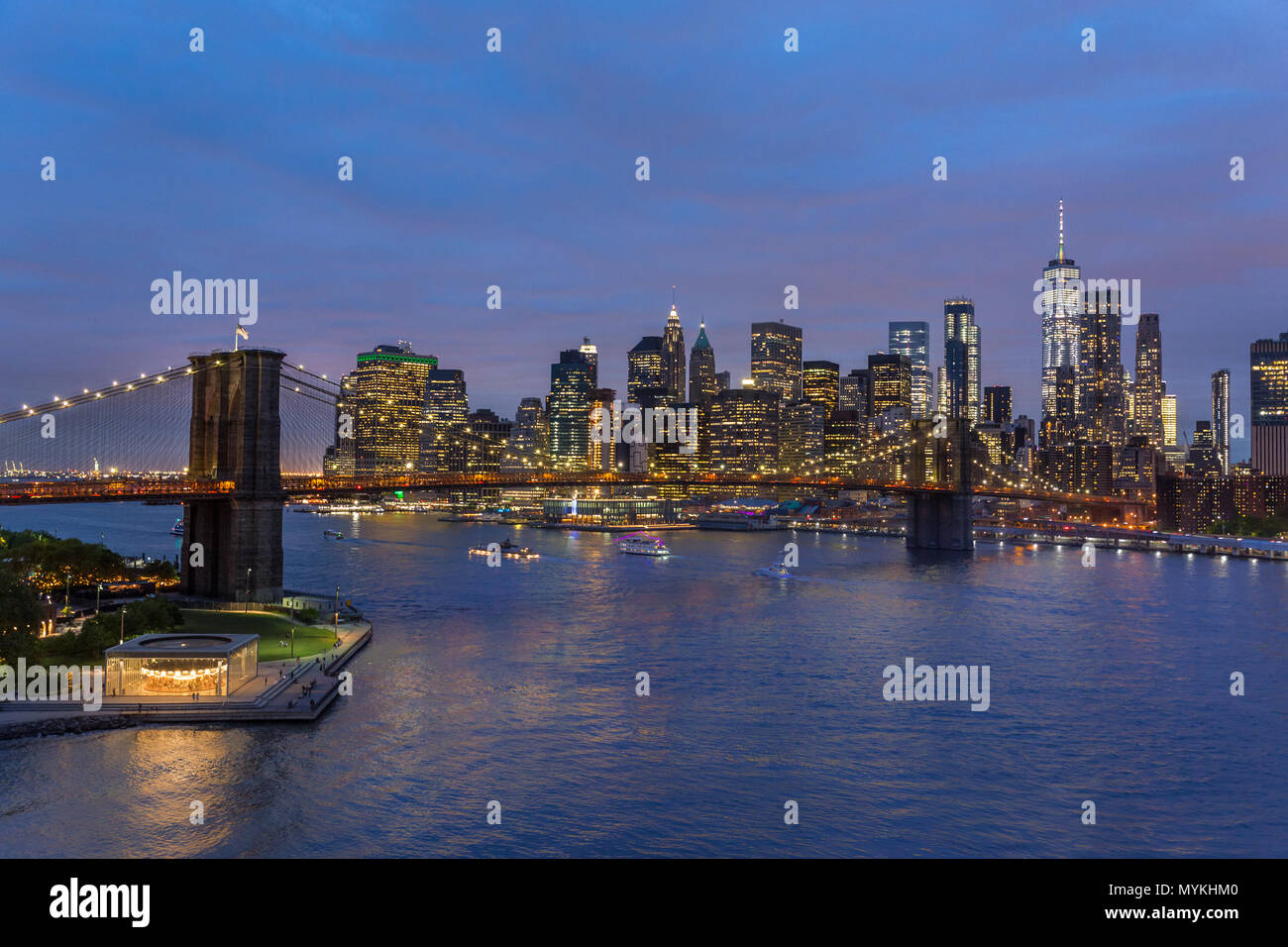 Brooklyn Bridge and Lower Manhattan skyline at night, New York city, USA. Stock Photo