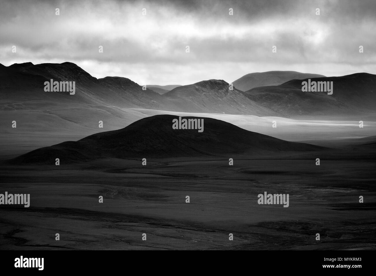 Barren, mountainous landscape with light and shades, monochrome, Mödrudalsfjallgardur, Highlands, Iceland Stock Photo