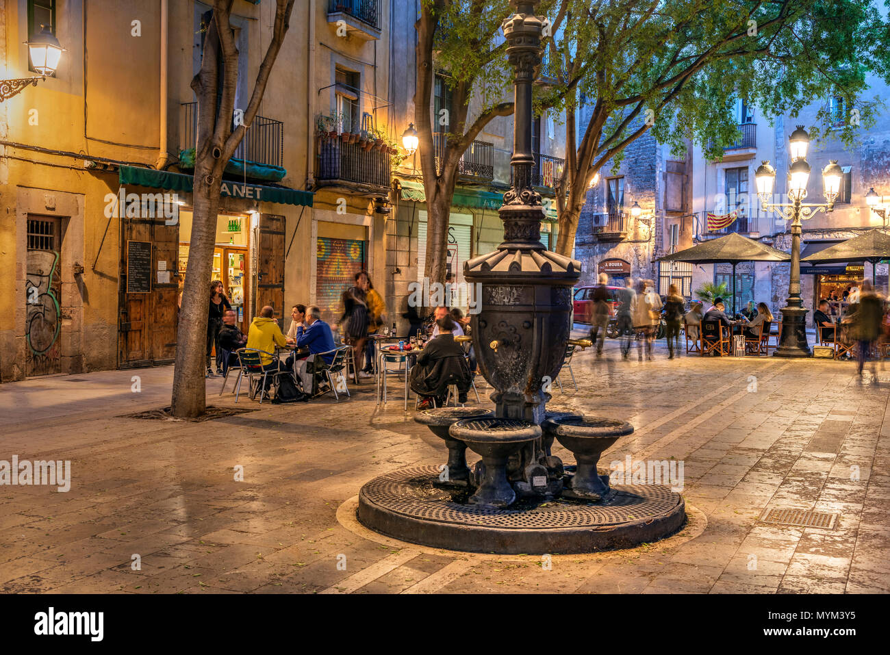 Small square in the old town with typical drinking fountain, Barcelona, Catalonia, Spain Stock Photo