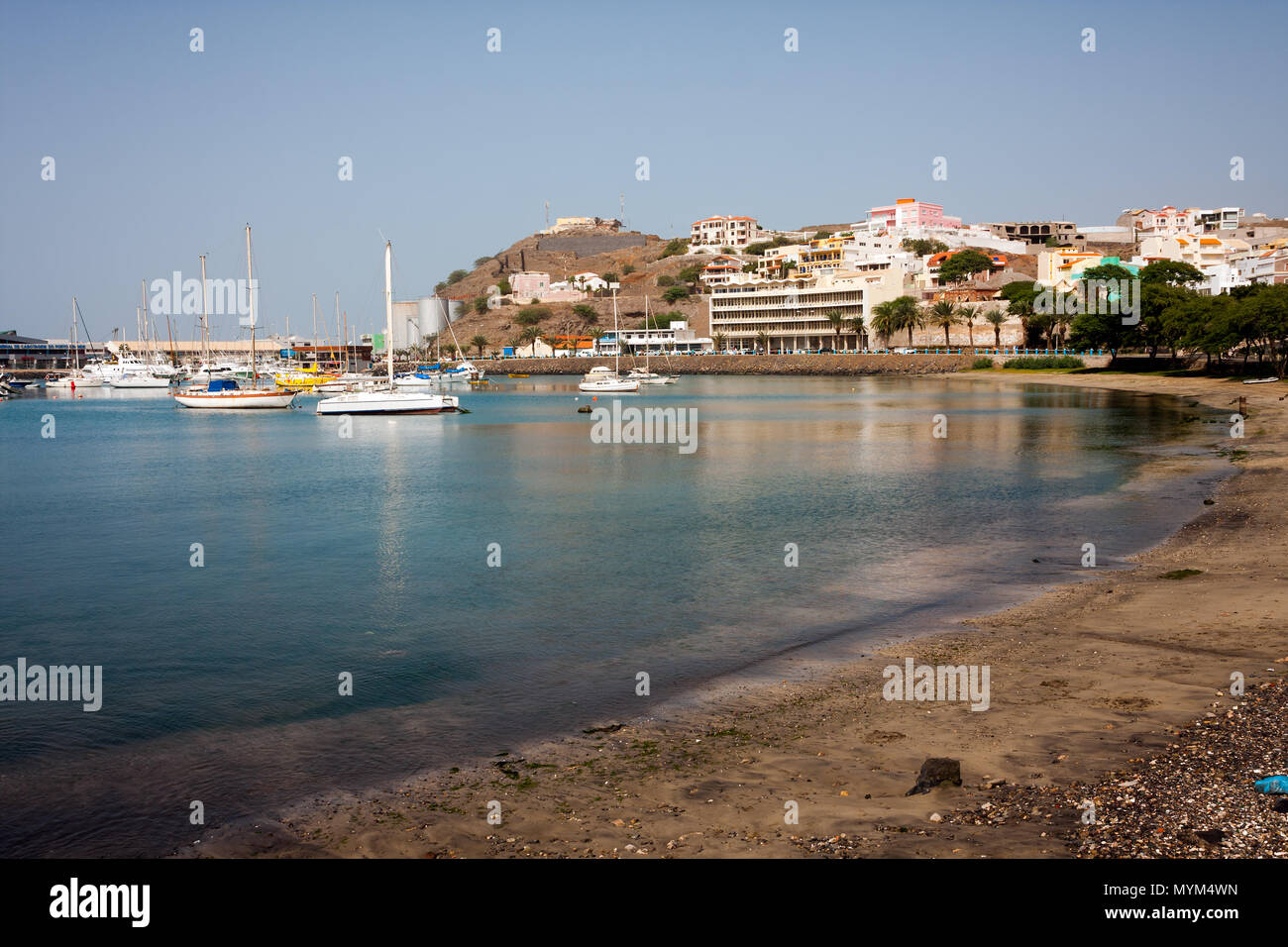 MINDELO, CAPE VERDE - DECEMBER 07, 2015: Sailboats in Marina of Sao Vicente island. Visible Fortim do Rei and maritime port agency AMP Stock Photo