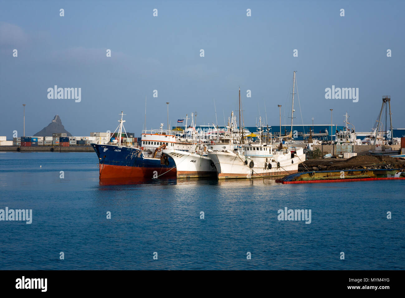 MINDELO, CAPE VERDE - DECEMBER 08, 2015: Old cargo ships in Porto Grande terminal of  Sao Vicente island Stock Photo