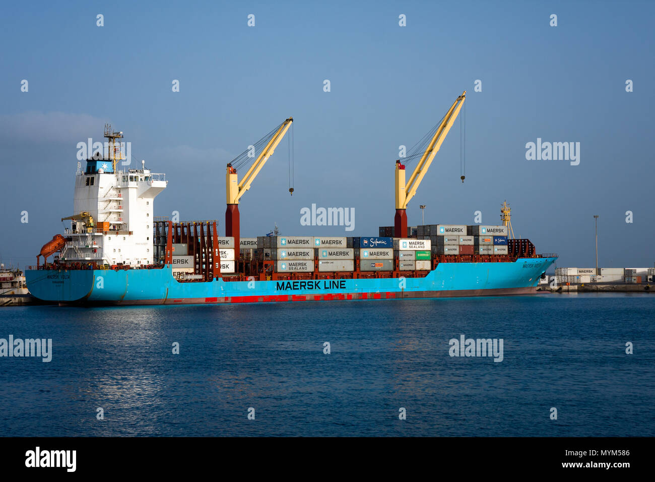 MINDELO, CAPE VERDE - DECEMBER 08, 2015: Maersk Line cargo container ship Volta in Porto Grande terminal of  Sao Vicente island Stock Photo
