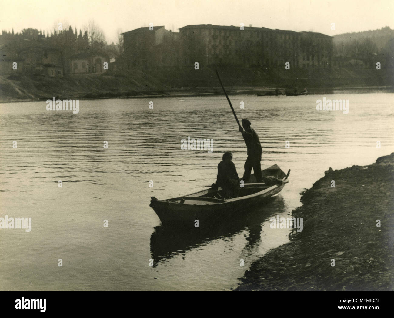 Small boat on the river Arno, Florence, Italy 1942 Stock Photo