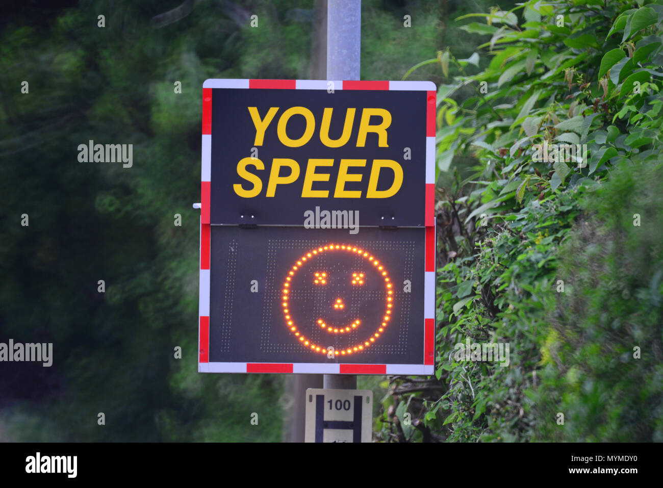 digital speed warning sign showing happy face when passing drivers are under the speed limit bramhope leeds united kingdom Stock Photo