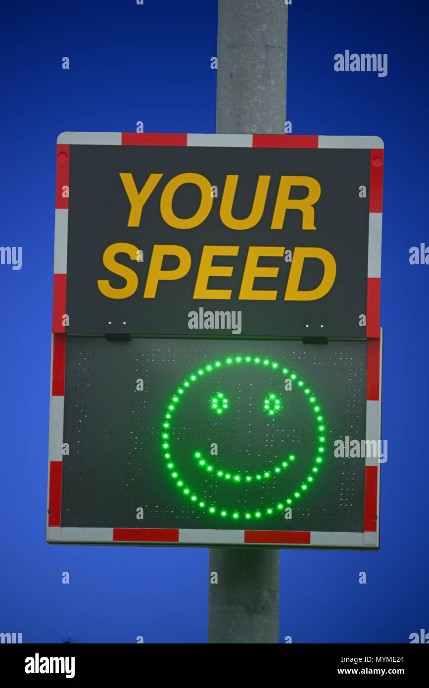 digital speed warning sign showing happy face when passing drivers are under the speed limit bramhope leeds united kingdom Stock Photo