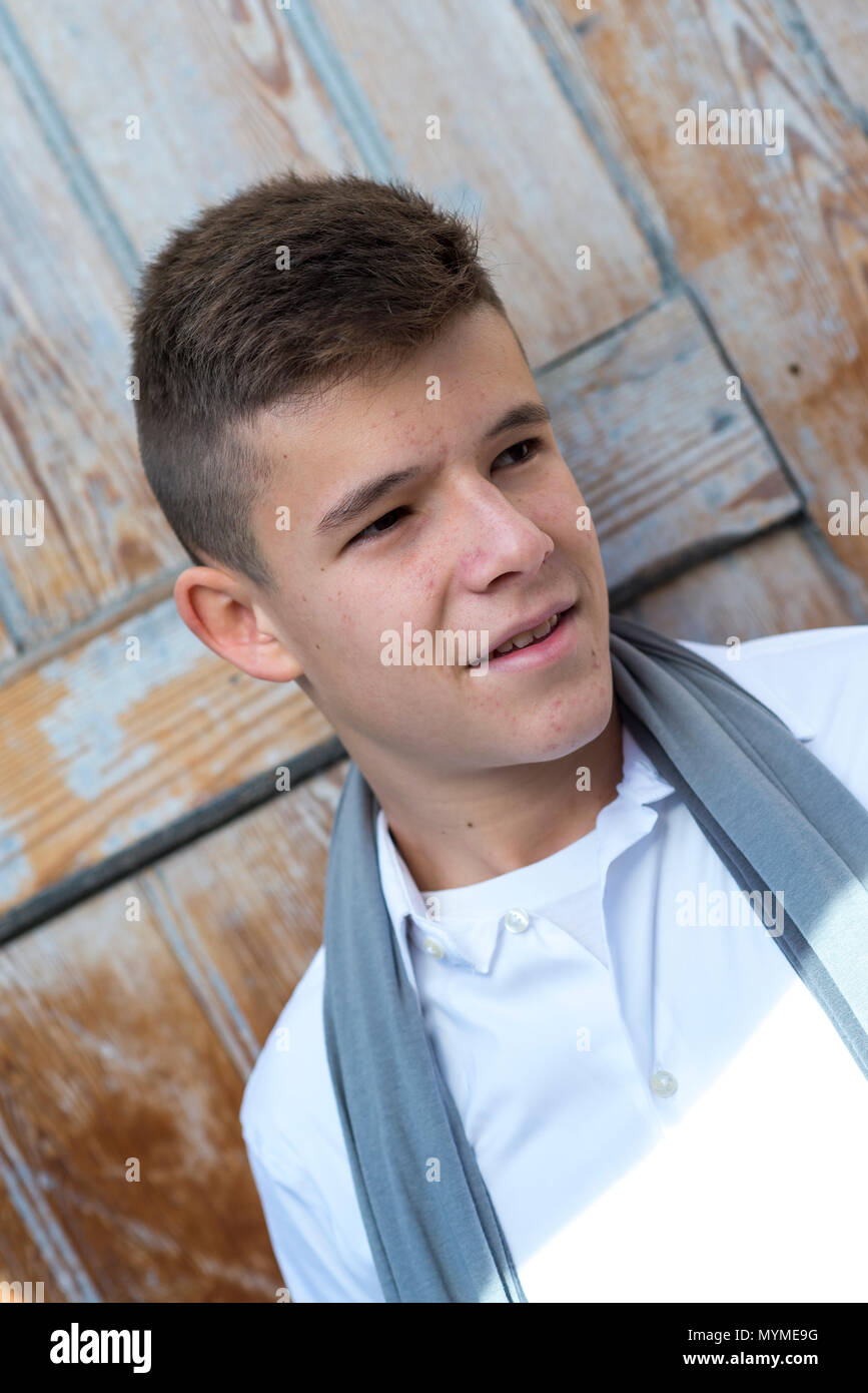Portrait of Handsome teenage boy outdoors Stock Photo - Alamy